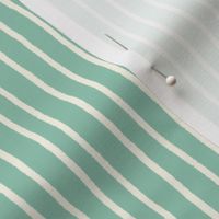Soft Pastel Hand drawn stripes lines streaks on soft green