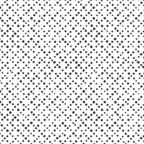 Dots and spots Organic black polka dots on white repeat pattern. Roll of the dice!