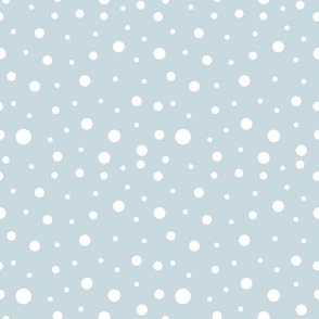 White polka dots on light blue