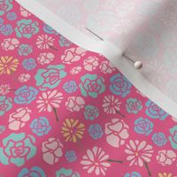 pink background with blue, white and yellow mini florals composition