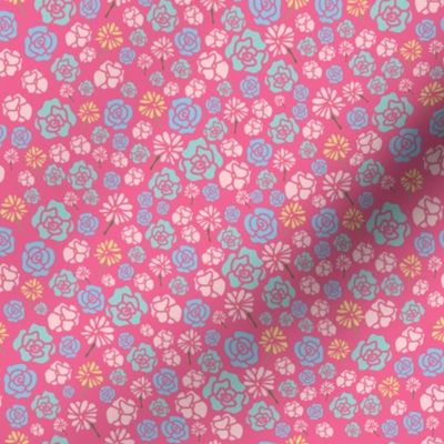 pink background with blue, white and yellow mini florals composition
