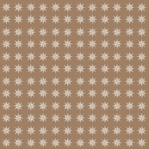 Compass rose star on toffee brown (small)