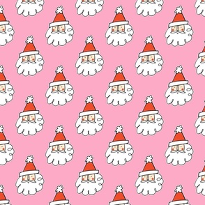 Cute Santa Faces:  happy Santa faces with red hat and jolly cheeks on bright pink background. 