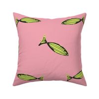 bright yellow green fish on pink