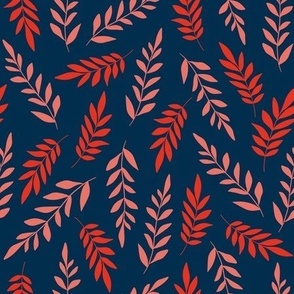 Leaves pink and crimson red on dark blue