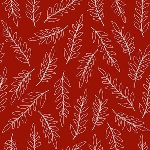 Leaves white outlines on crimson red 