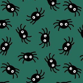 Big eyed cutesy spiders - sweet kawaii halloween monster design on forest green