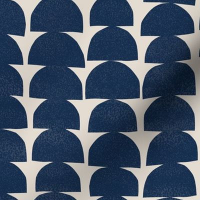 dark blue semi circles on cream background - small scale