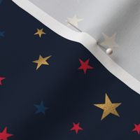 Festive pattern with stars. Blue, gold, red stars on a dark blue background.