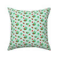 Juicy watermelons on a soft green background - small scale