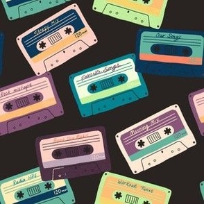 Cassette tapes in multicolors on a black background