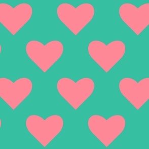 Bold-retro-pink-geometric-hearts-half-drop-on-plain-turquoise-green-background-XL-jumbo