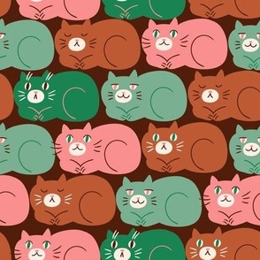 A lot of cats on dark background