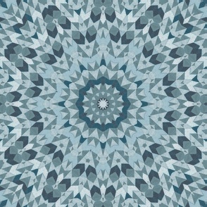 Monochrome light blue, kaleidoscopic pattern.  mandala. Light, muted blue ornament. 