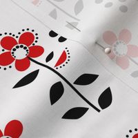 red flowers with black leaves on a white background