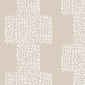 Warm neutral hand drawn dots in white and beige for refined bohemian