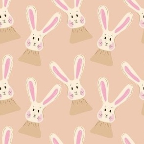  Cute rabbits on a beige background. Bunny for kids