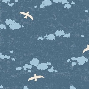birds flying in cloudy night sky cerulean blue on dark blue textured