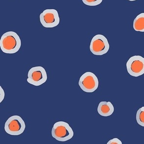 Orange dots on blue canvas 