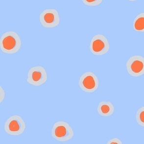 Orange circles on light blue canvas.