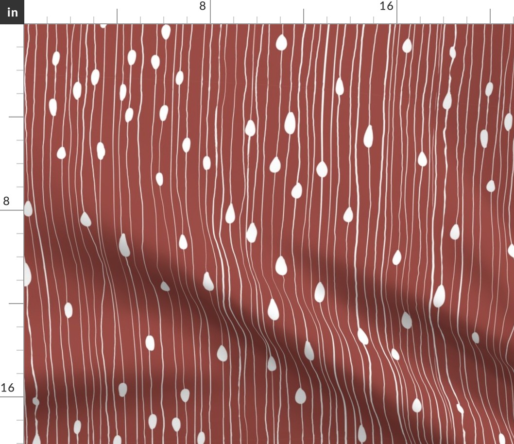Drops and dots with intermittent broken lines, off-white on dark earthy red / spanish red - medium scale