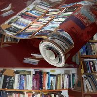 A cozy chair and books, books, books