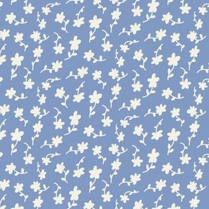 Ditsy flowers monochrome off-white on light blue