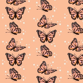 Monarch Butterfly with hearts on the wings in Peach Fuzz wallpaper