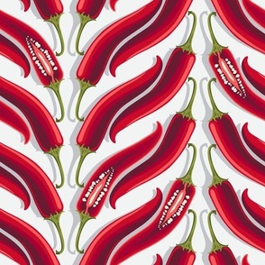 Large vertical stripes of hot peppers on a white background
