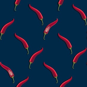 Hot peppers on a dark blue background