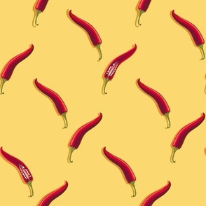 Hot peppers on a yellow background