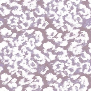 White and purple leopard pattern. White spots on a light grayish-purple background.
