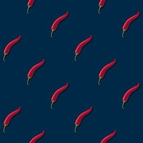 Small hot pepper on a dark blue background