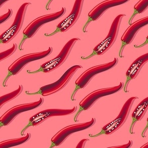 Hot peppers flying diagonally on a pink background