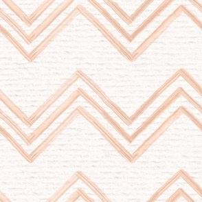 Hand drawn watercolor chevron zig zag stripes – painted geometric brush strokes on a warm cream watercolour paper texture. Beige and ecru with peach fuzz and apricot orange.