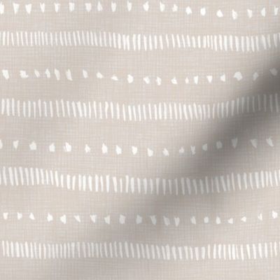 Organic Dashes and Dot Stripes in Warm Neutrals of Desert Sand and White
