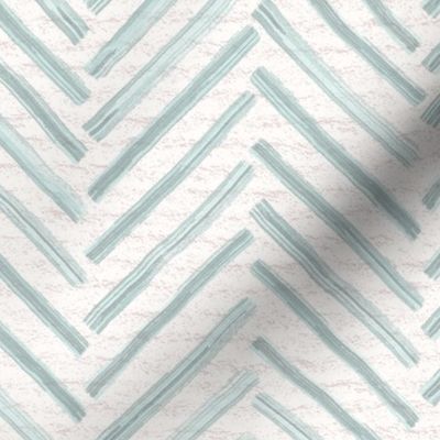 Hand drawn watercolor herringbone pattern – painted geometric brush strokes on a warm cream watercolour paper texture. Beige and ecru with renew blue and turquoise celadon.