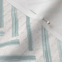Hand drawn watercolor herringbone pattern – painted geometric brush strokes on a warm cream watercolour paper texture. Beige and ecru with renew blue and turquoise celadon.