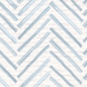 Hand drawn watercolor herringbone pattern – painted geometric brush strokes on a warm cream watercolour paper texture. Beige and ecru with thermal blue and baby blue.