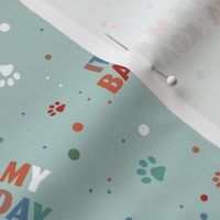 Colorful rainbow barkday design with confetti paws and happy birthday text for dogs on soft teal LARGE