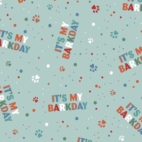 Colorful rainbow barkday design with confetti paws and happy birthday text for dogs on soft teal LARGE