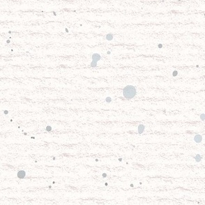 Hand drawn watercolour paint splashes and speckles – painted brush strokes on a warm cream watercolour paper texture. Beige and ecru with upward grey and slate blue-gray.