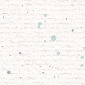 Hand drawn watercolour paint splashes and speckles – painted brush strokes on a warm cream watercolour paper texture. Beige and ecru with renew blue and cyan celadon.