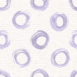 Hand drawn watercolour circles and rings – painted geometric brush strokes on a warm cream watercolour paper texture. Beige and ecru with digital lavender and lilac purple.