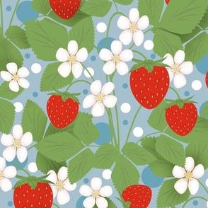 Cute strawberry pattern. Red strawberries with white and pink flowers on a blue polka dot background.