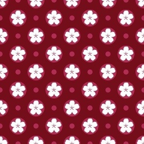 Geometrical white sakura flowers and dots on red background 