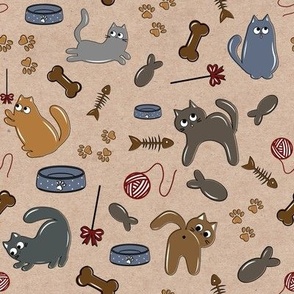 Playful cats in different poses on a light brown background