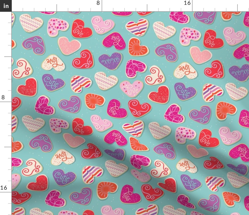 Valentine's Day Sugar Cookies  in Pink, Purple, Orange, and Red on an Aqua Background