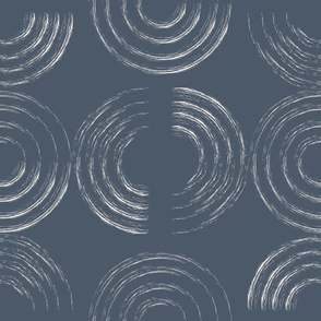 Boho macrame:  light circles in blue background