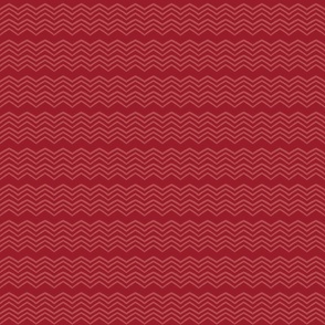 Zig zag or chevron design in a monochromatic shade of deep crimson red